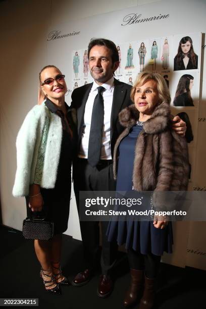 Backstage at the Blumarine show during Milan Fashion Week Autumn/Winter 2016/17, singer Anastacia with Blumarine founder Anna Molinari and her son...