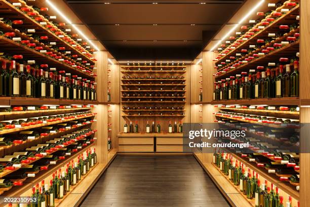 liquor store with wine bottles on shelves - wine cellar stock pictures, royalty-free photos & images