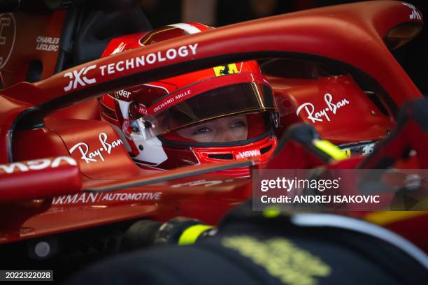 Ferrari's Monegasque driver Charles Leclerc prepares to drive during the second day of the Formula One pre-season testing at the Bahrain...