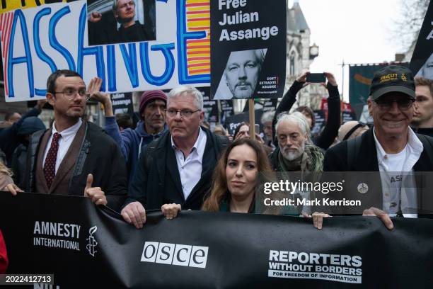 Stella Assange is pictured with Gabriel Shipton, Kristinn Hrafnsson, Ben Westwood and Vincent De Stefano during a march from the Royal Courts of...