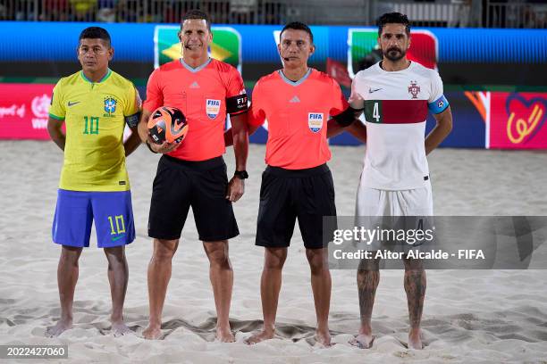 Captains of Portugal and Brazil Datinha and Torres pose for a photo during the FIFA Beach Soccer World Cup UAE 2024 Group D match between Brazil and...