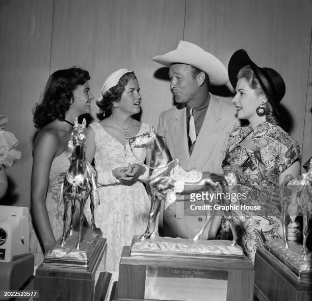 American actress Natalie Wood, Roy Rogers' daughter Cheryl Rogers, American actor and singer Roy Rogers, and American actress Mala Powers. 'Trigger'...
