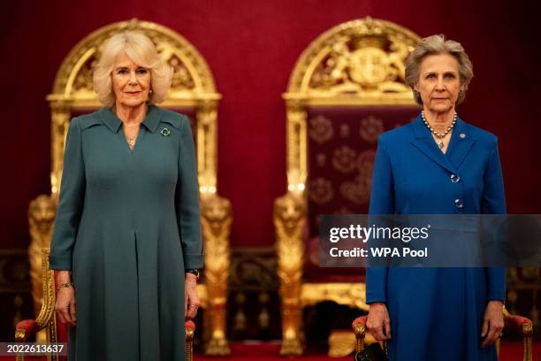Queen Camilla stands with Birgitte, Duchess of Gloucester, during an event to present the Queen's Anniversary Prizes for Higher and Further...