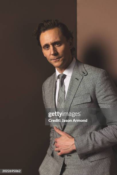 Actor Tom Hiddleston is photographed for Los Angeles on February 18, 2024 at the People's Choice Awards at Santa Monica's Barker Hangar in Long...