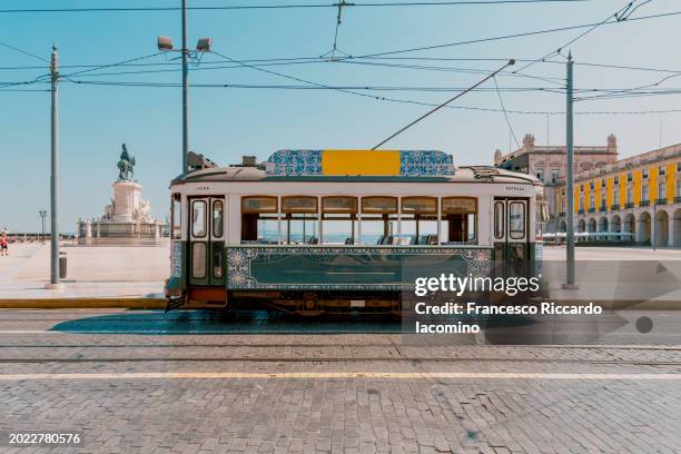 iconic lisbon tram and square. portugal - lissabon stockfoto's en -beelden