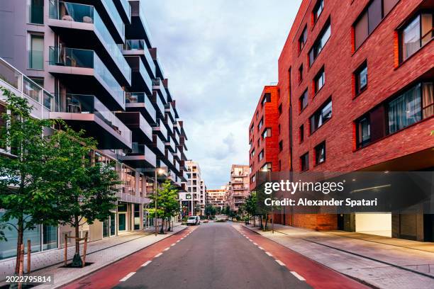 street in bjorvika district at dusk, oslo, norway - oslo business stock pictures, royalty-free photos & images