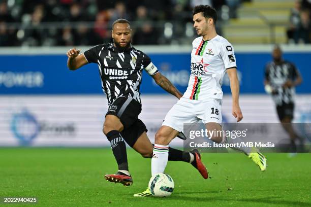 Marco Ilaimaharitra of Charleroi defending on Florian Miguel of OHL during the Jupiler Pro League season 2023 - 2024 match day 26 between Oud...