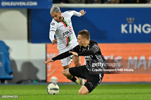 Youssef Maziz of OHL fighting for the ball with Daan Heymans of Charleroi during the Jupiler Pro League season 2023 - 2024 match day 26 between Oud...