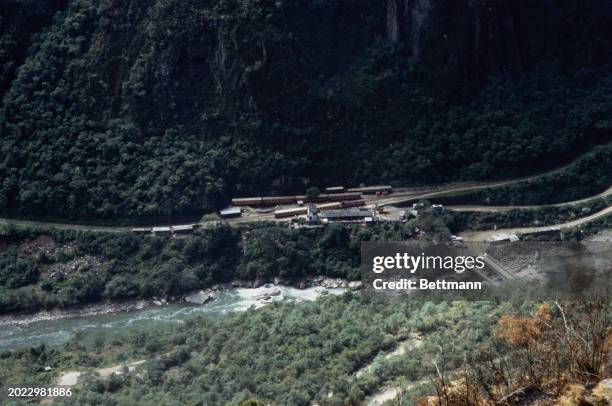 View of Pachar train station and the Vilcanota River from Machu Picchu, Peru, circa 1979.