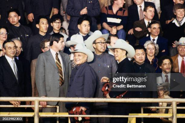 Chinese Vice Premier Deng Xiaoping wearing a Stetson cowboy hat presented to him at a rodeo he attended in Simonton, Texas, February 2nd 1979. Next...