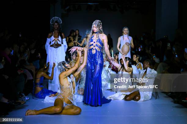 Models walk the runway at the DI PETSA show during London Fashion Week February 2024 at the BFC NEWGEN Show Space on February 19, 2024 in London,...