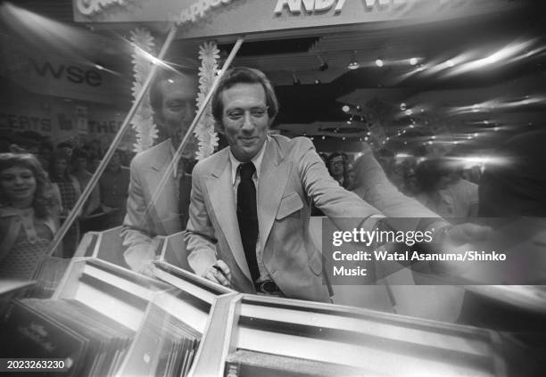 American singer and actor Andy Williams at Chappell Music Shop, London for autograph session in 1970s.