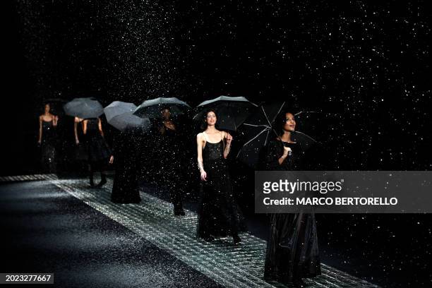 Models walk the runway during the Emporio Armani collection show at the Milan Fashion Week Womenswear Autumn/Winter 2024-2025 on February 22, 2024 in...