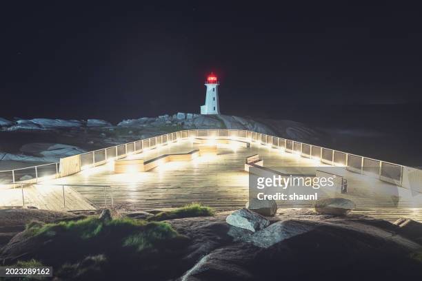 peggy's cove lighthouse - peggy's cove stock pictures, royalty-free photos & images