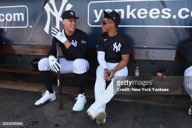 Aaron Judge talks with Juan Soto of the New York Yankees during spring training at George M. Steinbrenner Field on February 21, 2024 in Tampa,...
