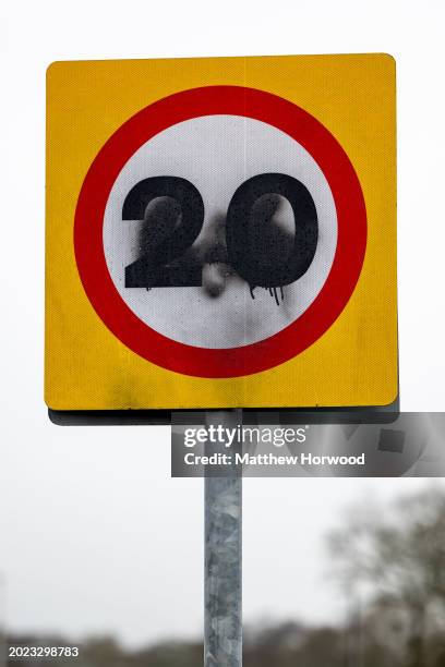 Vandalised 20mph road sign on February 22, 2024 in Cardiff, Wales. A default 20mph speed limit has been introduced on restricted roads across Wales.