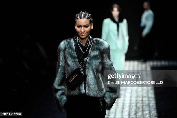 Model walks the runway during the Emporio Armani collection show at the Milan Fashion Week Womenswear Autumn/Winter 2024-2025 on February 22, 2024 in...