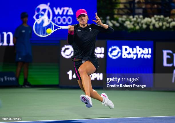 Iga Swiatek of Poland in action against Qinwen Zheng of China in the quarter-final on Day 5 of the Dubai Duty Free Tennis Championships, part of the...