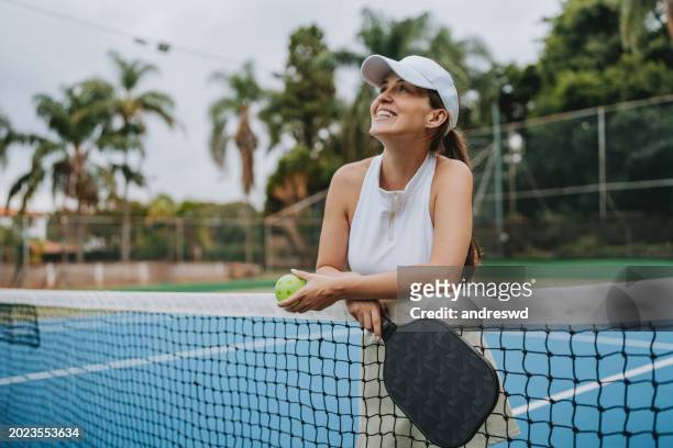 portrait pickleball athlete woman - country club woman stock pictures, royalty-free photos & images