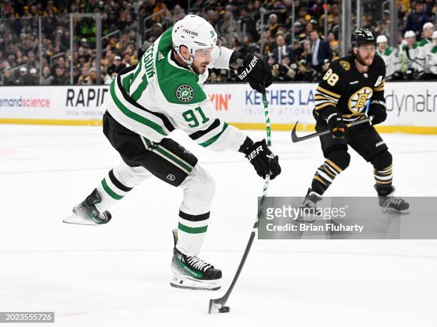Tyler Seguin of the Dallas Stars takes a shot against the Boston Bruins during an overtime period at the TD Garden on February 19, 2024 in Boston,...