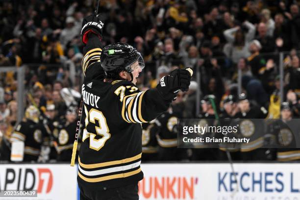 Charlie McAvoy of the Boston Bruins reacts after a goal scored by David Pastrnak against the Dallas Stars during the third period at the TD Garden on...