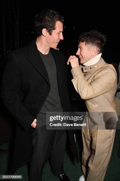 Callum Turner and Barry Keoghan attend the Burberry Winter 2024 show during London Fashion Week on February 19, 2024 in London, England.