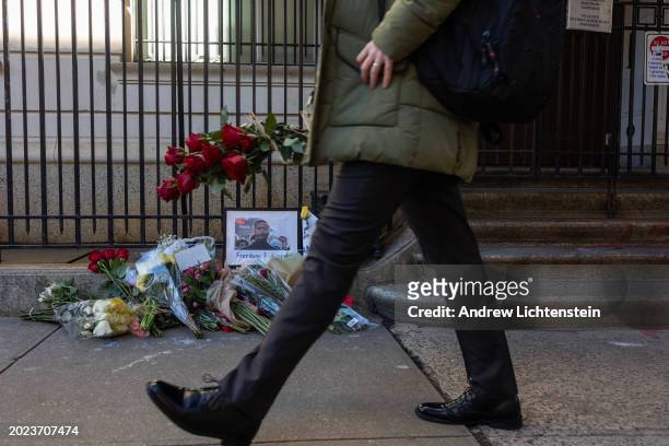 Flowers and candles in memory of Russian dissident Alexei Navalny are shown outside the Russian Consulate, February 19 in New York City. The contents...