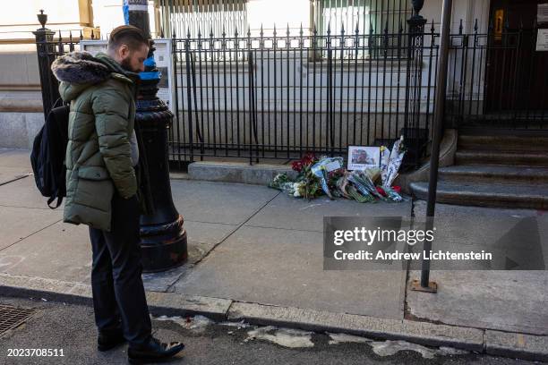 Flowers and candles in memory of Russian dissident Alexei Navalny are shown outside the Russian Consulate, February 19 in New York City. The contents...