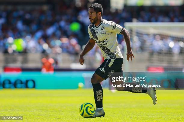Brayan Angulo of Puebla drives the ball during the 6th round match between Pumas UNAM and Puebla as part of the Torneo Clausura 2024 Liga MX at...
