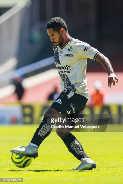 Brayan Angulo of Puebla drives the ball during the 6th round match between Pumas UNAM and Puebla as part of the Torneo Clausura 2024 Liga MX at...