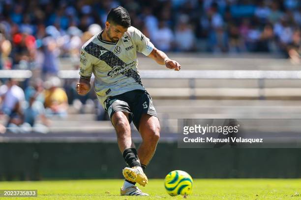 Diego de Buen of Puebla kicks the ball during the 6th round match between Pumas UNAM and Puebla as part of the Torneo Clausura 2024 Liga MX at...