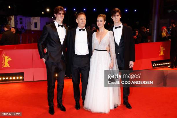 Italian pornographic actor, director and producer Rocco Siffredi poses with wife Rosa Caracciolo and sons Leonardo Tano and Lorenzo Tano as they...
