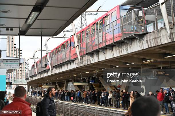 Docklands Light Railway DLR train arrives at the upper platform at West Ham station on February 16, 2024 in London, England.