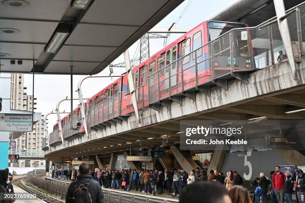 Docklands Light Railway DLR train arrives at the upper platform at West Ham station on February 16, 2024 in London, England.