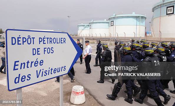 Fish In Riot French riot police evacuates protesting fishermen blocking an oil ...