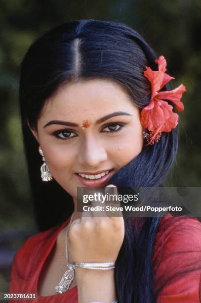 Indian actress Padmini Kolhapure awaits the arrival of Prince Charles at the Rajkamal Kalamandir film studio in Bombay, India during a visit to the...