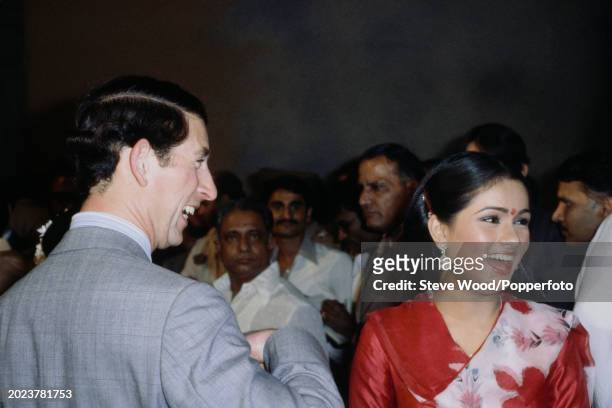 Prince Charles meeting Indian actress Padmini Kolhapure at the Rajkamal Kalamandir film studio in Bombay, India during a visit to the country in...