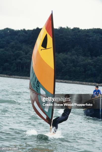 Prince Charles windsurfing at Cowes on the Isle of Wight, England on 5th August, 1980.