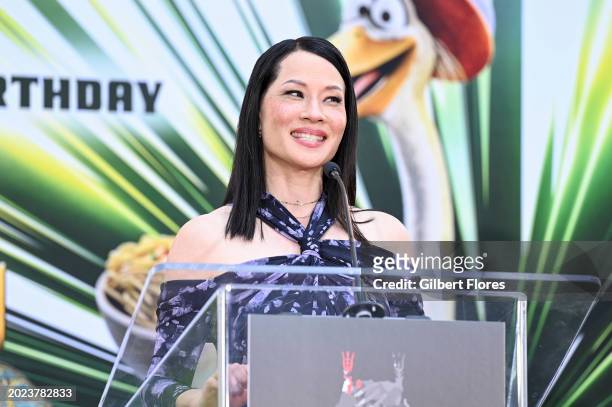 Lucy Liu speaks onstage at the Hand and Footprint Ceremony honoring James Hong held at TCL Chinese Theatre IMAX® on February 22, 2024 in Los Angeles,...
