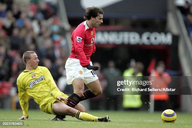 November 20: Ruud Van Nistelrooy of Manchester United and Chris Perry of Charlton Athletic challenge during the Premier League match between...
