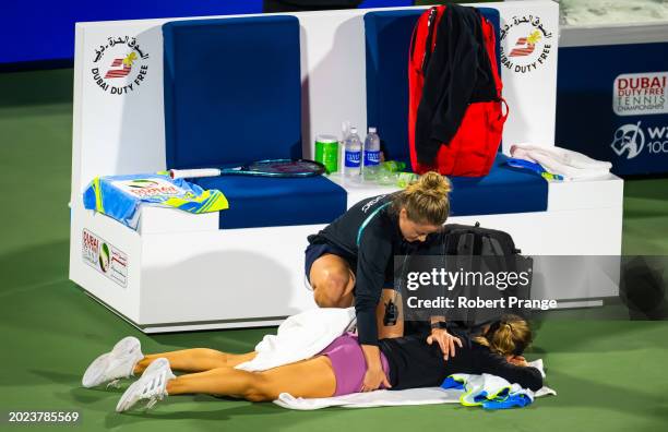 Anna Kalinskaya receives medical treatment while playin against Coco Gauff of the United States in the quarter-final on Day 5 of the Dubai Duty Free...