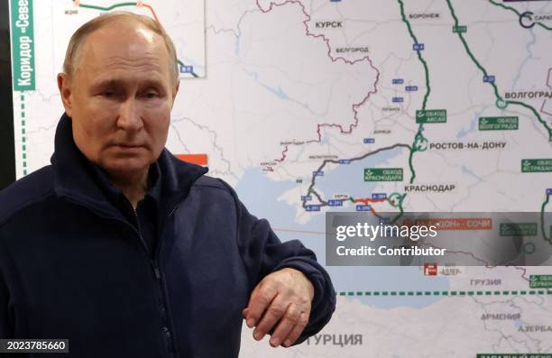 Russian President Vladimir Putin observes a road map of Southern part of Russia, Black Sea and Eastern part of Ukraine during a presentation at a gas...