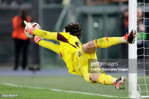 Mile Svilar of AS Roma stopping a penalty during the UEFA Europa League match between AS Roma v Feyenoord at the Stadio Olimpico Rome on February 22,...