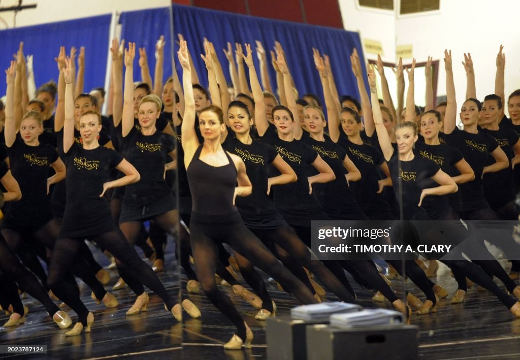 Ny Rockets TOPSHOT - The world-famous Radio City Rockettes are reflected in a ...