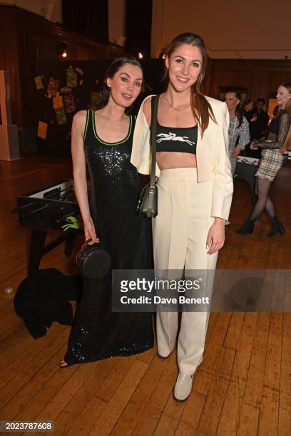 Poppy Corby-Tuech and Raine Storey attend the Longchamp University cocktail party at Goodenough College on February 22, 2024 in London, England.