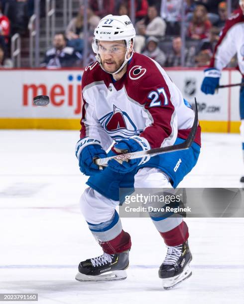 Jonathan Drouin of the Colorado Avalanche backhands the puck up ice against the Detroit Red Wings during the second period at Little Caesars Arena on...