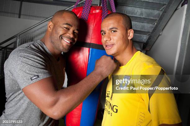 American mixed martial artist Rashad Evans gives some tips in cage fighting to Aston Villa footballer Gabby Agbonlahor on November 3, 2011 in...