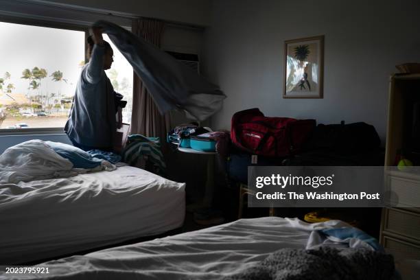 Kahului, United States Nesi Va'a is pictured in her hotel room where she lives out of suitcases. It is her family's eighth move since losing their...