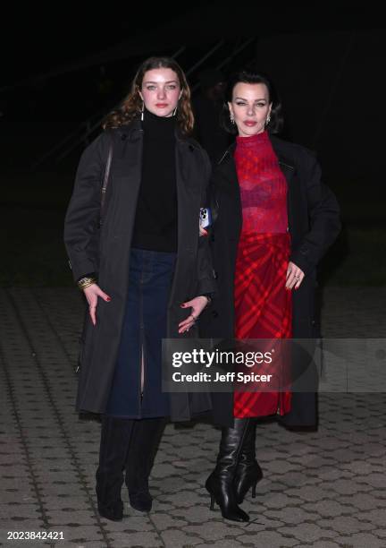 Giulia Isabel Corcos and Debi Mazar attend the Burberry show during London Fashion Week February 2024 in Victoria Park on February 19, 2024 in...