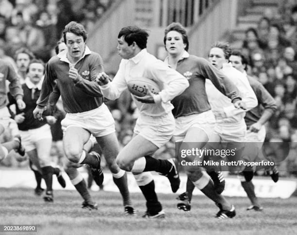 Rory Underwood of England breaks through the defence during the Five Nations Championship match between England and Wales at Twickenham Stadium on...